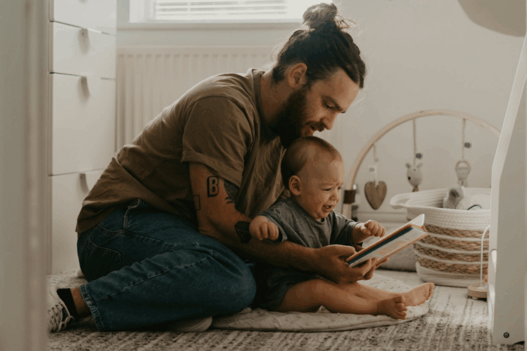 vader met baby (foto: Toa Heftiba via Unsplash)